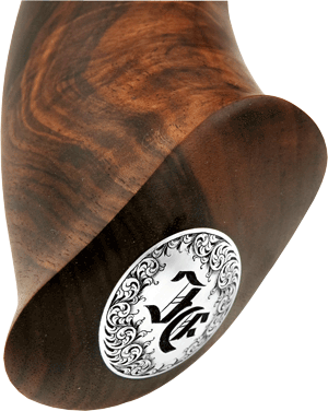 Inlay of pure silver with an engraved monogram and English arabesques as an edging